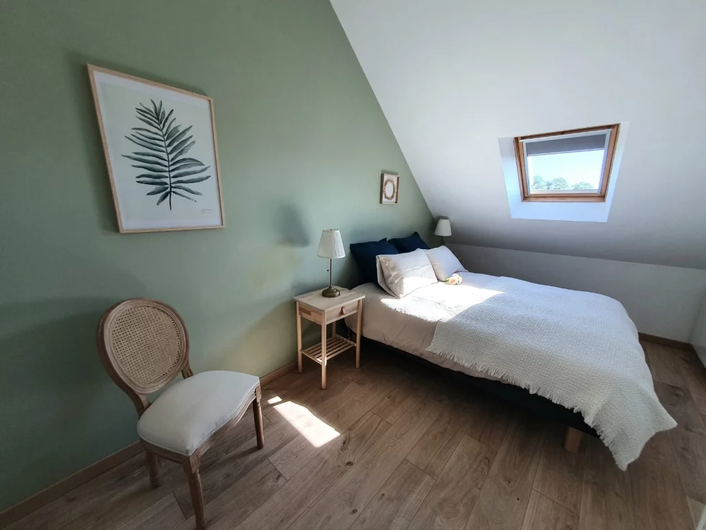 Une chambre du gîte de normandie de le clos de baron sur odon